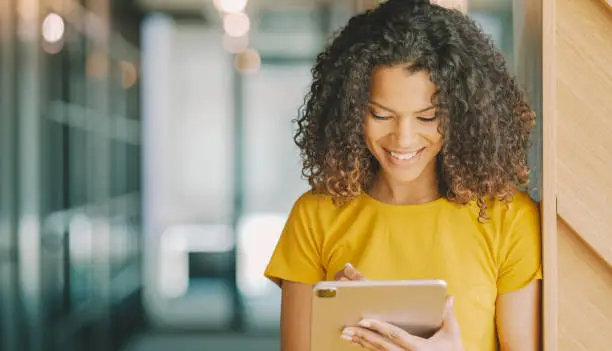 Mixed race businesswoman in coworking space