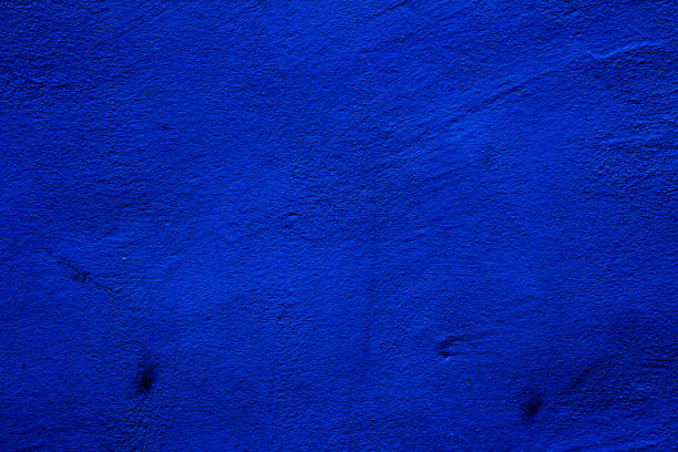istock Blue colored abstract wall background with textures of different shades of blue 1321915541