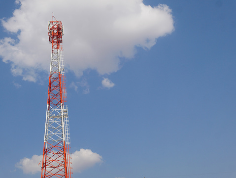 Telephone towers used to broadcast signals at dusk.