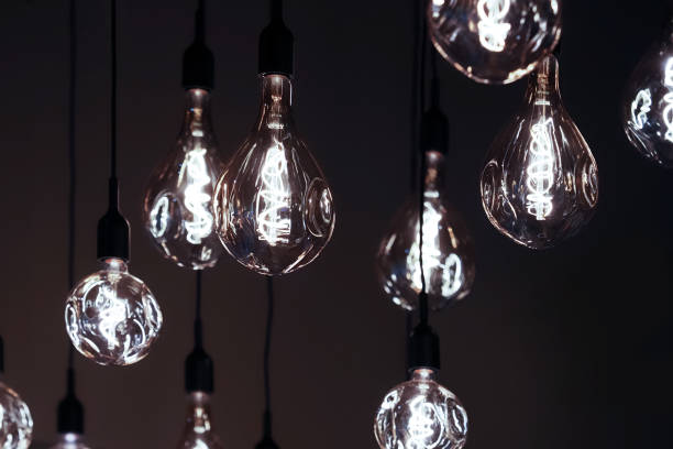 istock Glow in the dark decorative light bulbs. Lighting decor 1321920151