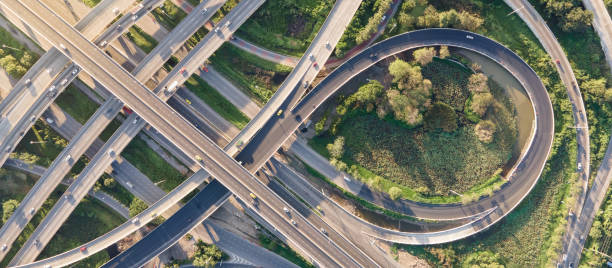 istock Aerial view of road interchange or highway intersection 1321925824