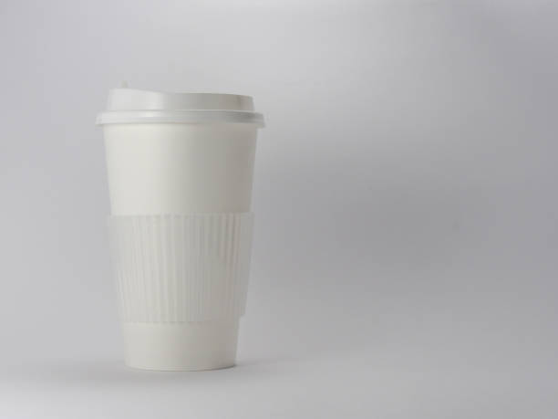 istock Takeaway white blank paper coffee cup mock up with cup lid isolated on white background. 1321927742