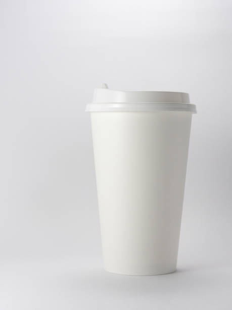 istock Takeaway white blank paper coffee cup mock up with cup lid isolated on white background. 1321927775