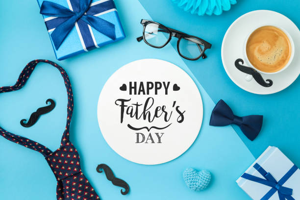 istock Happy Fathers day concept with coffee cup,  tie bow and gift box on blue background 1321931213