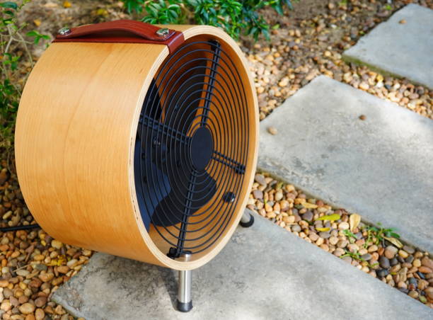 istock Small fan working outdoors in garden 1321931835