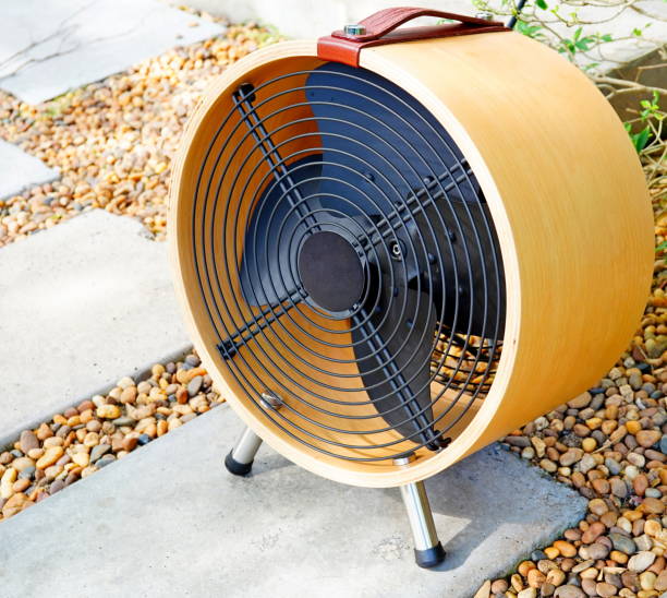 istock Small fan working outdoors in garden 1321931854
