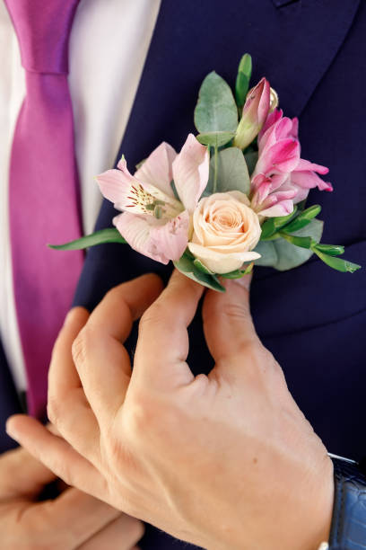istock groom and boutonniere 1321934101