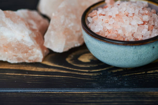 istock pink salt in a ceramic bowl with copy space 1321935569