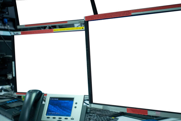istock group of blank monitors and screen on security desk or control room for monitor process or stock data trading. 1321940806