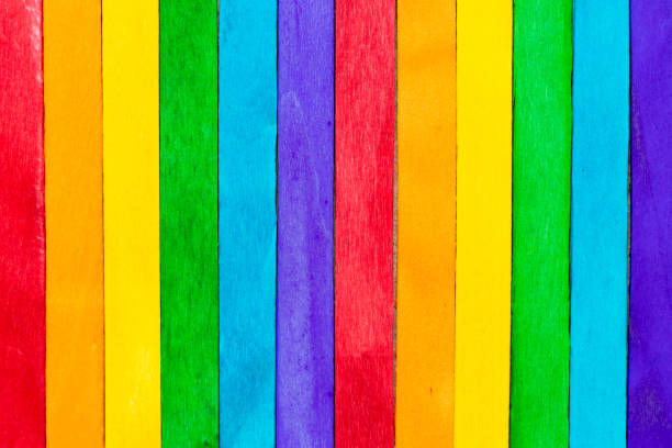 istock Multi color wood plank use as textured background, frame, decoration with copy space (Concept for rainbow or LGBT) 1321944290