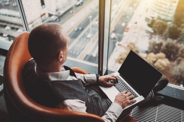 istock A man entrepreneur with a laptop 1321945381