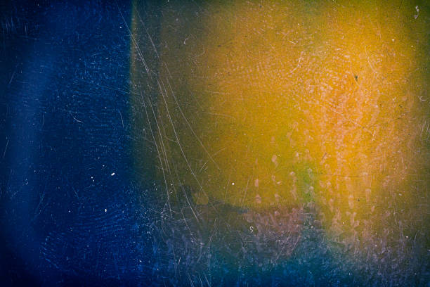 istock Abstract colorful scratched film background 1321945499