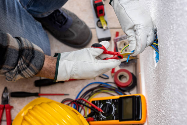 istock Electrician at work on a residential electrical system. Electricity. 1321948961