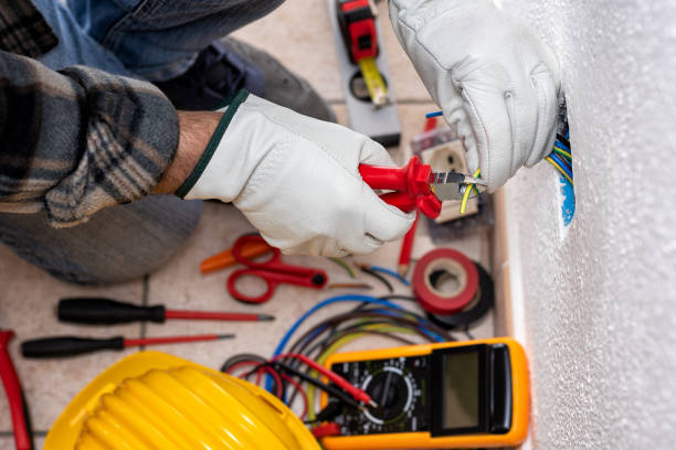 istock Electrician at work on a residential electrical system. Electricity. 1321948970