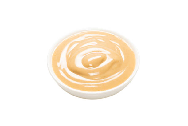 istock Mushroom sauce in a bowl isolated on white background. 1321949905