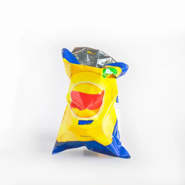 Photo of Potato chips bag isolated on white background.Snack packaging.