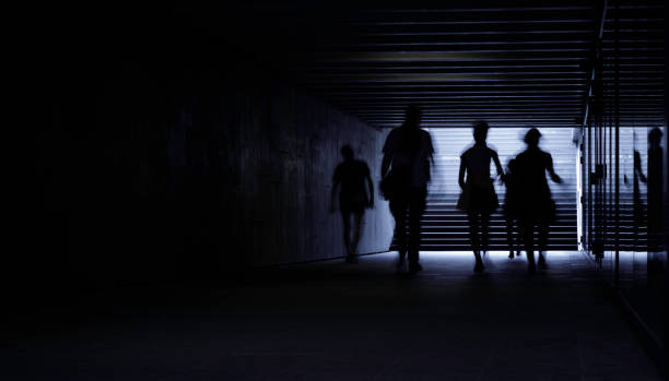 istock People walking in the tunnel/underpass 1321956042