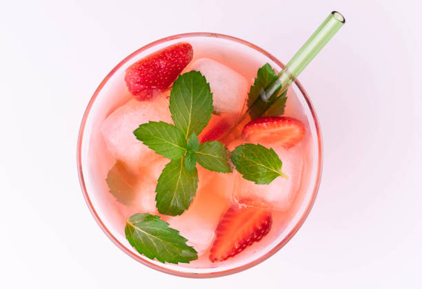 istock Strawberry drink with ice and mint on a white background. Flat lay. 1321956043