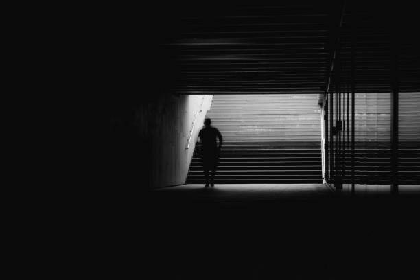 istock A man walking in the tunnel/underpass 1321956048
