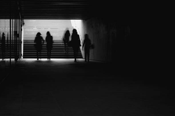istock Women walking in the tunnel/underpass 1321956049