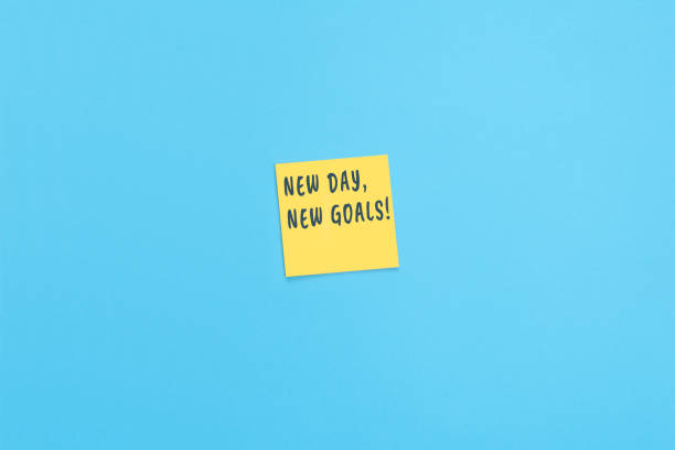 istock Sticky notes with inscription New day - new goals! 1321962137