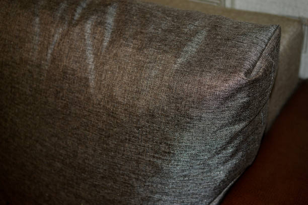 the-surface-of-the-silver-sofa-close-up-in-the-house.jpg?s=612x612&w=0&k=20&c=T5mxF5D2pmAmNf_yeWOSRz9jECNnwmuMPb51vNglYaI=