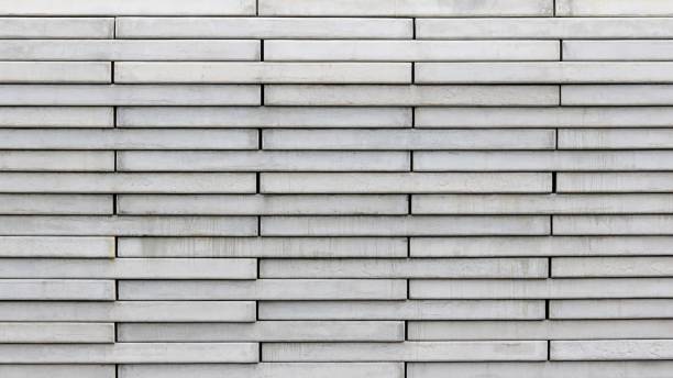 istock Texture of the stacked cement wall background 1321975787
