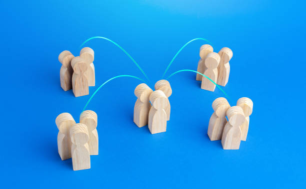 istock Communication between groups of people. Joining efforts, cooperation in a global project. Collaboration. Unity teamwork. Complication of society organization. Merging into a bigger formation 1321977116