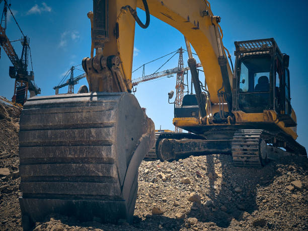 istock Low angle view of excavator at construction site 1321987741