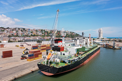 Aerial view of an International port, Business logistics concept, Cargo Container ship in import export and business logistics, Shipping harbor.