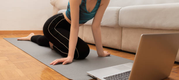 istock Unrecognozible woman doing yoga 1321996554