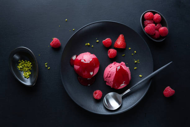istock Fruity strawberry Ice cream scoops with strawberry sauce served on plate 1322007083