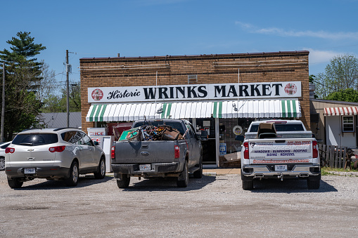 Lebanon, Missouri - May 5, 2021: Cars parked outside the busy, historic Wrinks Market, a general store along Route 66