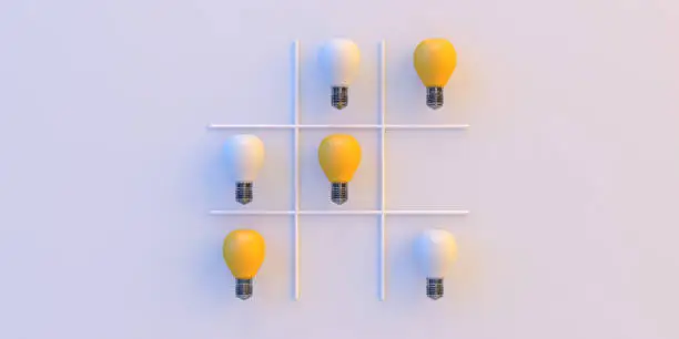 Photo of tic-tac-toe with light bulb 3d concept