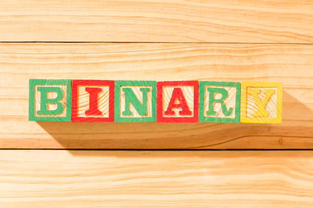 istock Spectacular wooden cubes with the word BINARY on a wooden surface. 1322018850