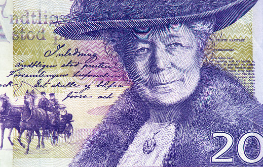 Portrait of Swedish author and teacher Selma Lagerlöf, horses and carriage.