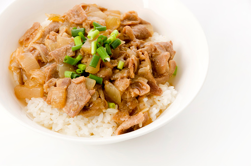 Japanese food, bowl of rice topped with pork and Konjac.