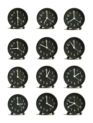 Abstract pattern analog clock showing different periods of time black isolated white background