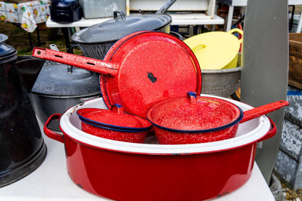 Kettles  and a pans outside on a second hand market in the netherlands