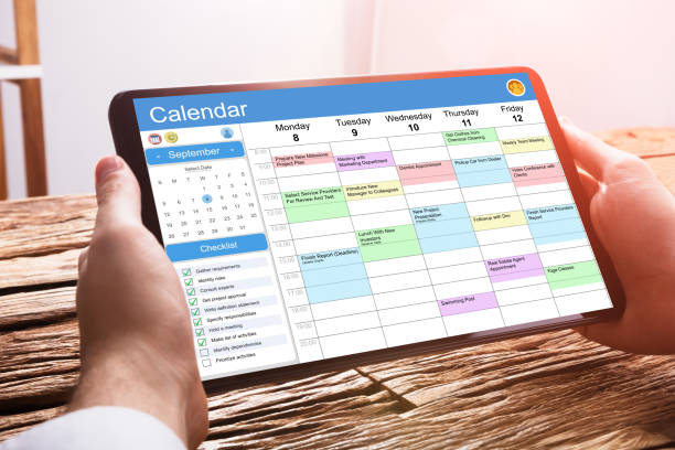 istock Businessperson Using Calendar On Digital Tablet 1322047898