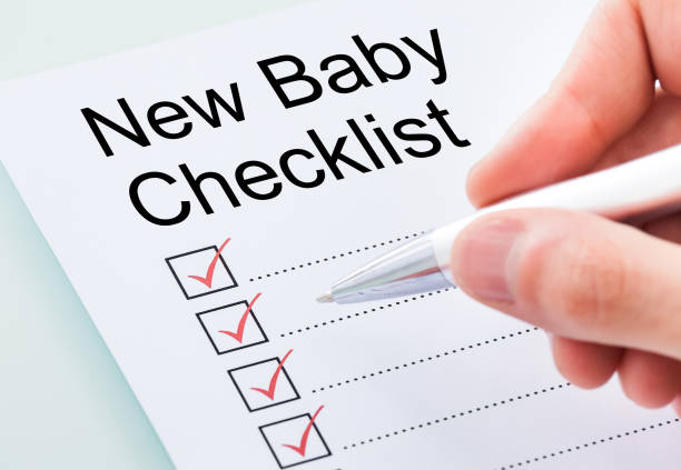 istock Person's Hand Marking On Checklist With Pen 1322047909