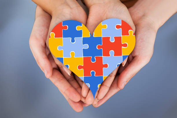 istock Couple Holding Heart Shape In Cupped Hands 1322047975