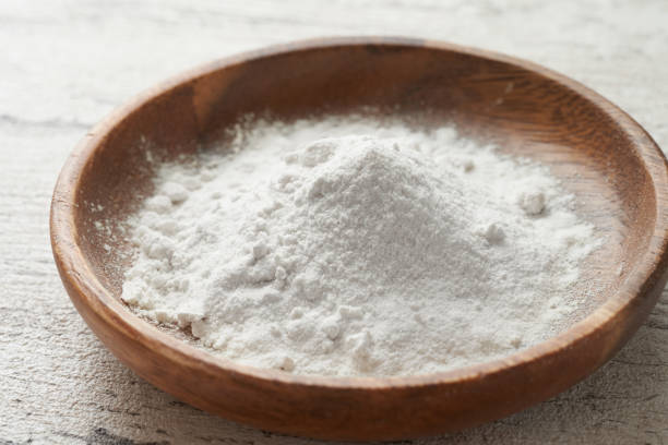 istock Flour in a wooden bowl 1322048983