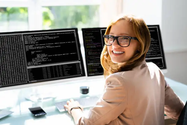 Photo of Programmer Woman Coding On Computer