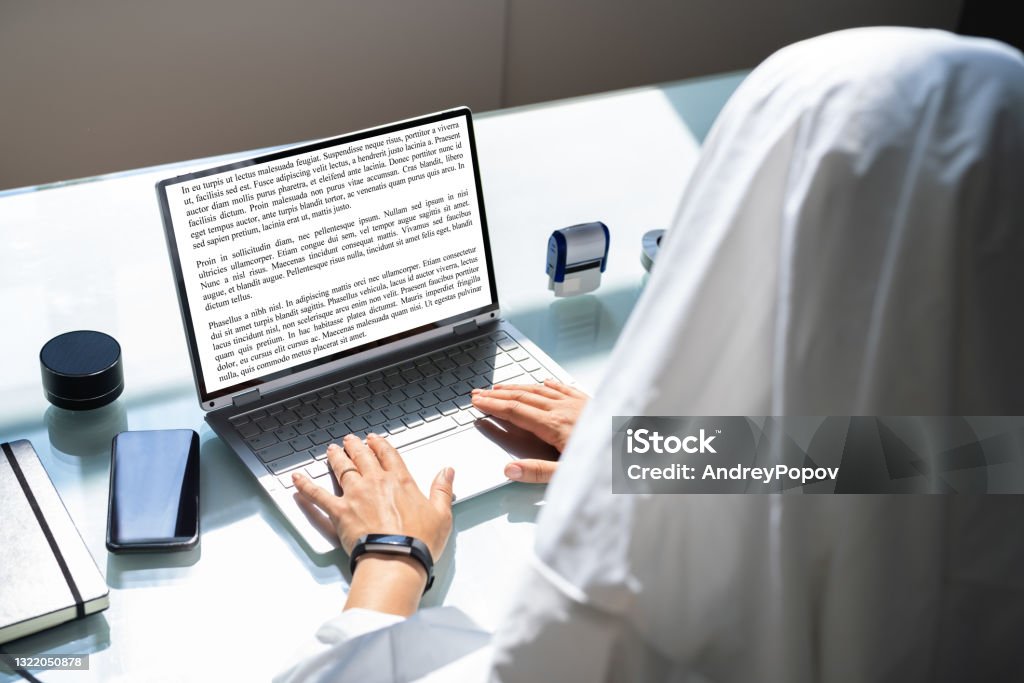 Ghostwriter Writing On Office Computer. Ghost Writer Ghostwriter Writing On Office Computer. Ghost Writer Using Laptop 30-34 Years Stock Photo