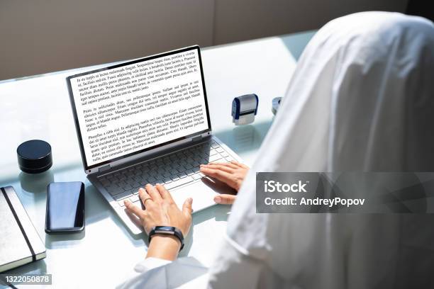 Ghostwriter Writing On Office Computer Ghost Writer Stock Photo - Download Image Now