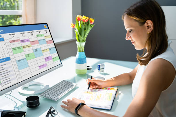 istock Looking At Calendar Schedule And Agenda 1322050904
