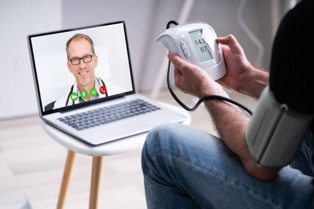 istock Old Senior Man With Hypertension Video Conferencing 1322051870