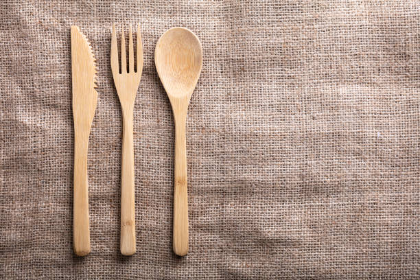 An Overhead View Of Wooden Spoon, Fork And Knife