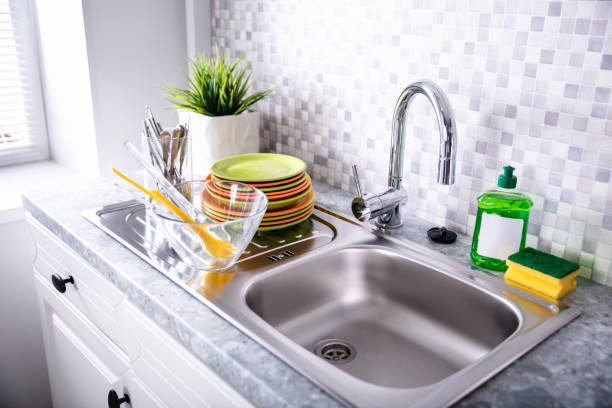 istock Utensils Near Sink And Faucet 1322052052